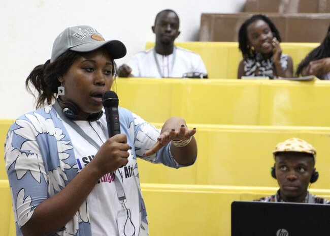 A&#x20;person&#x20;speaking&#x20;at&#x20;the&#x20;2nd&#x20;Men&#x20;Engage&#x20;Africa&#x20;symposium&#x20;jpg